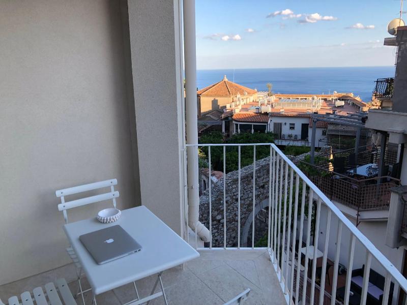  Comfort One-Bedroom Apartment with Balcony and Partial Sea VIew image 2