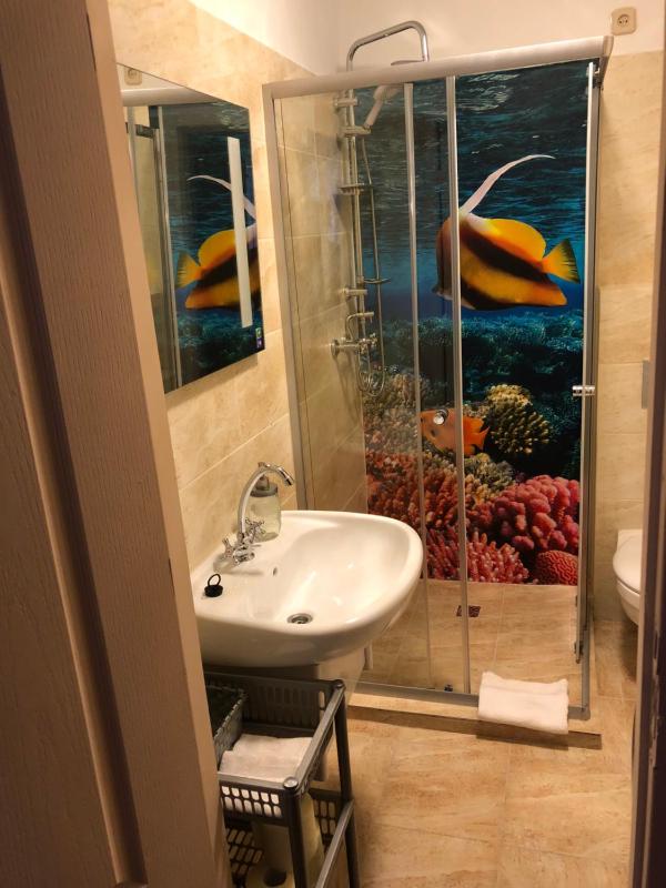 Standard Triple Room with Private Bathroom image 2