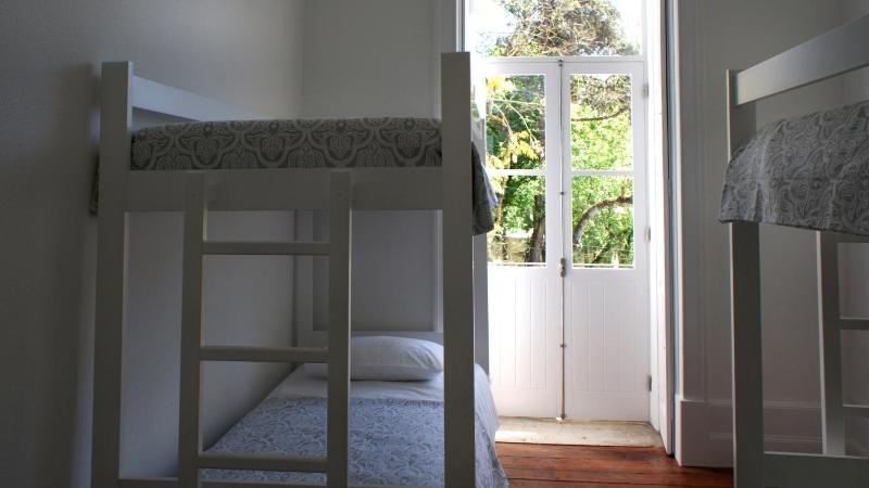 Bed in 4-Bed Dormitory Room with Shared Bathroom image 2