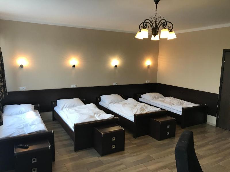 Quadruple Room with Private Bathroom image 2