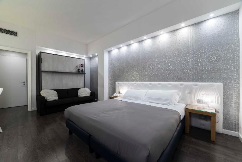 Deluxe Quadruple Room image 1
