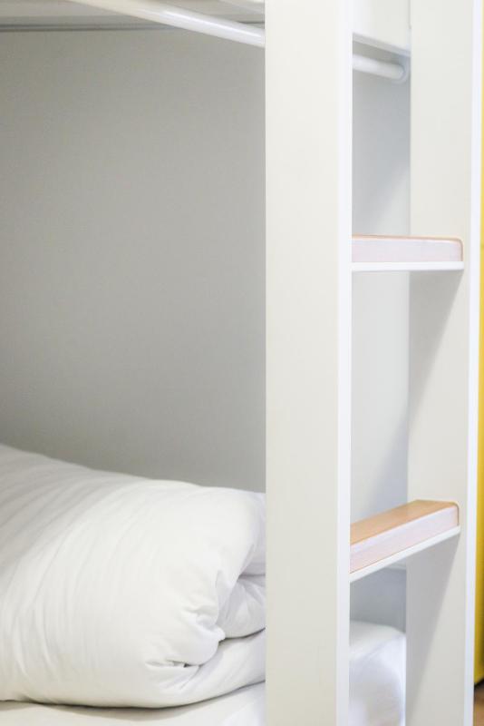 Bed in 10-Bed Dormitory Room with Shared Bathroom image 3