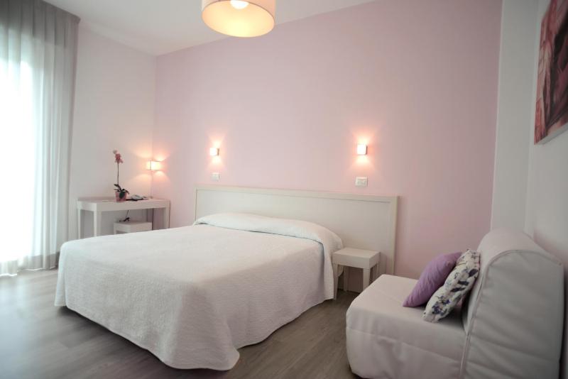 Quadruple Room with Balcony image 3