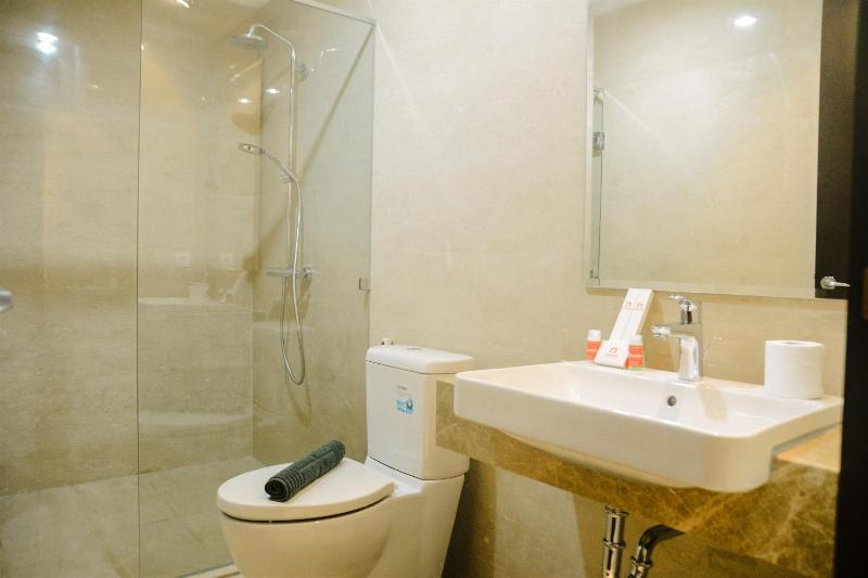 2BR Deluxe and Modern Menteng Park Apartment By Travelio - image 3