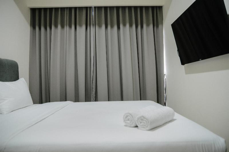 2BR Deluxe and Modern Menteng Park Apartment By Travelio - image 15