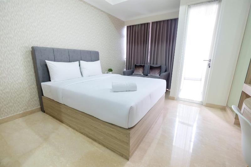 Minimalist Studio Menteng Park Apartment By Travelio - image 3