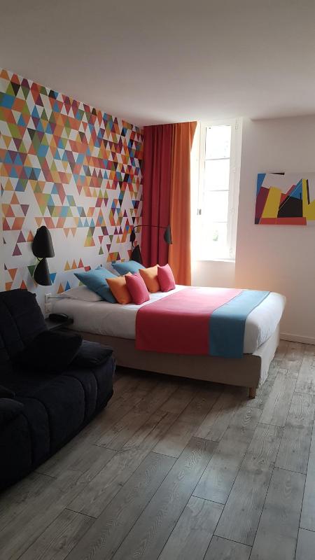 Quadruple Room with Private Bathroom image 1