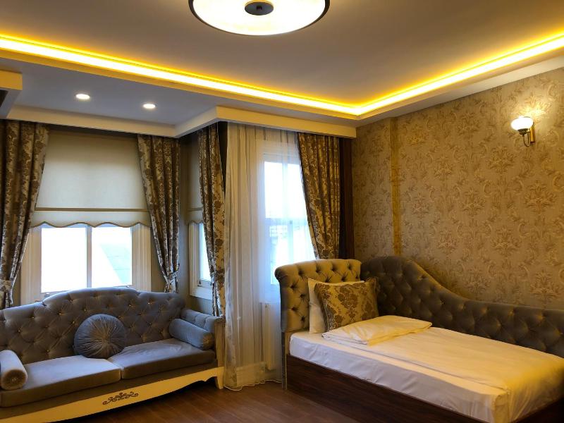 Rose Mansion by Otantik Suites - image 14
