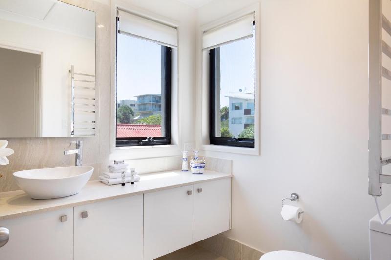 Wake up to ocean views in stylish comfort - image 6