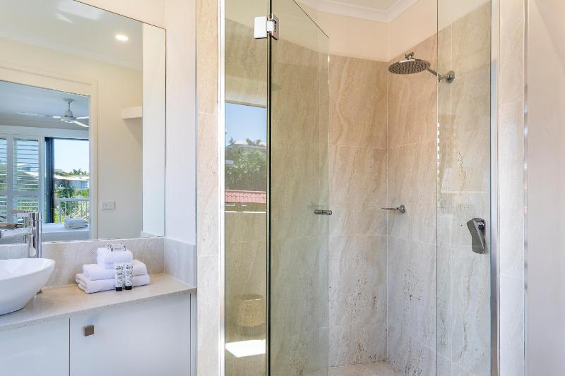 Wake up to ocean views in stylish comfort - image 8