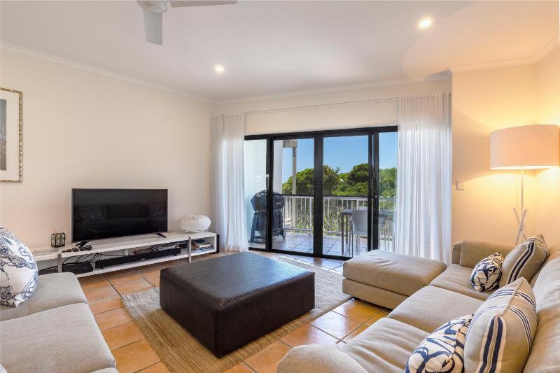 Wake up to ocean views in stylish comfort - image 7