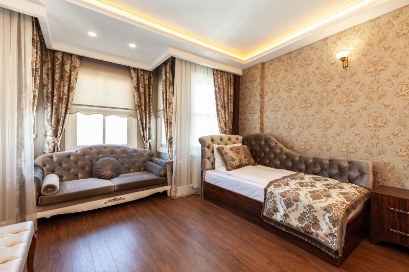 Rose Mansion by Otantik Suites - image 11