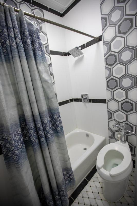 Deluxe King Room - Private Bathroom image 3