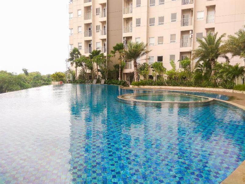 Modern Apartment Studio No Kitchen Mustika Golf Residence By Travelio - image 6