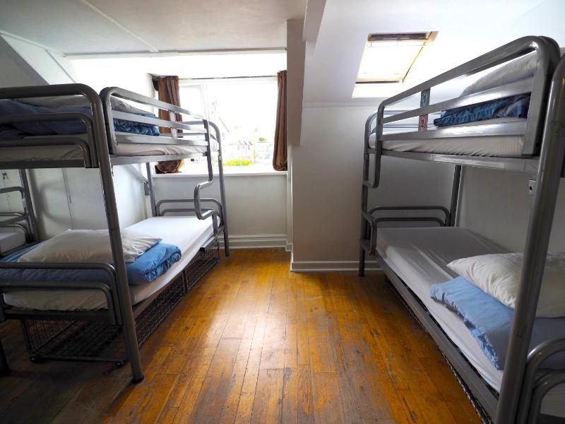 Bed in 8-Bed Mixed Dormitory Room with Shared External Bathroom image 4