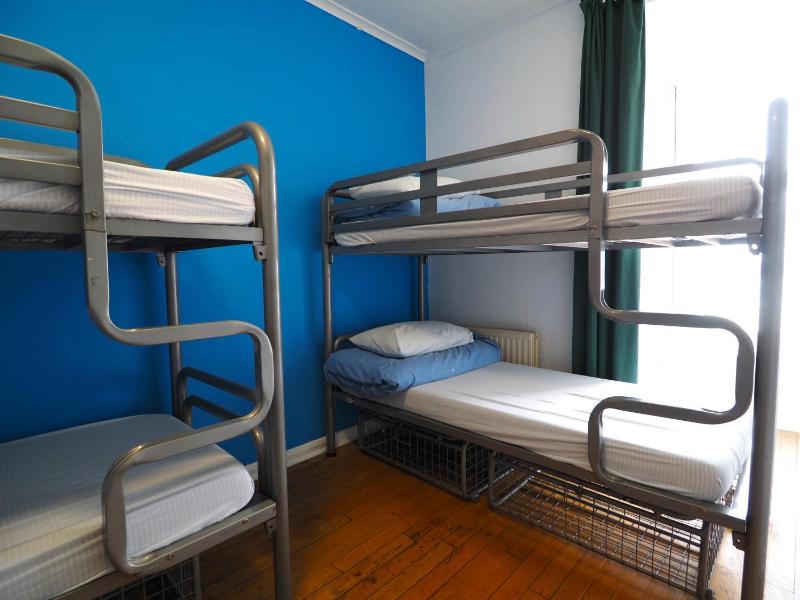 Bed in 4-Bed Mixed Dormitory Room with Shared External Bathroom image 3