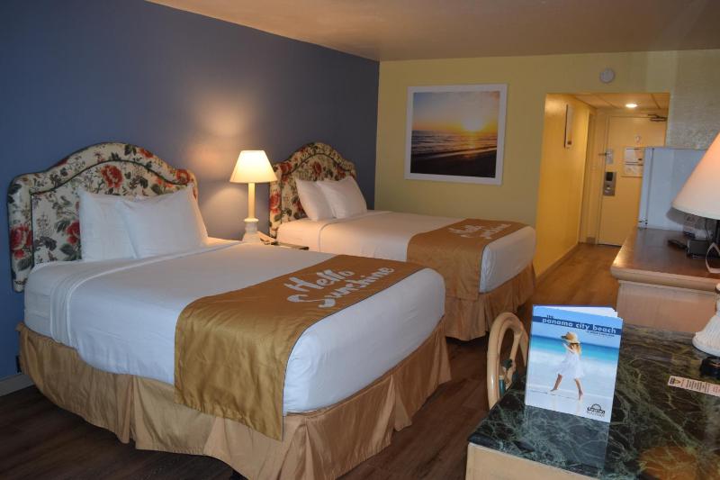 Queen Room with Two Queen Beds and Beach View - Non-Smoking image 1