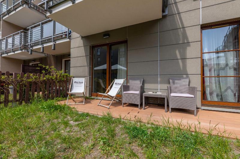 Victus Blue Apartment with Parking and Terrace by Noclegi Renters - image 8