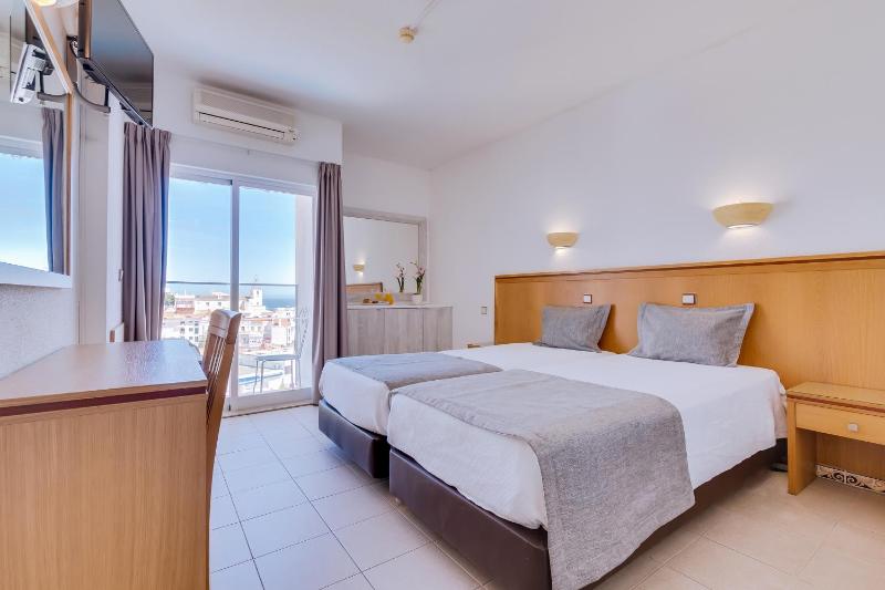 Twin Room with Extra Bed (2 Adults + 1 Child) image 2