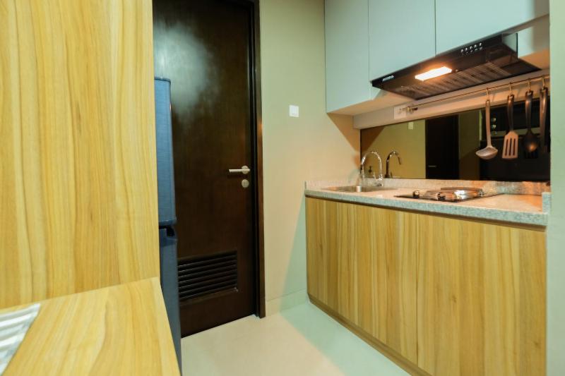 Best Location 1BR Apartment Mustika Golf Residence By Travelio - image 11