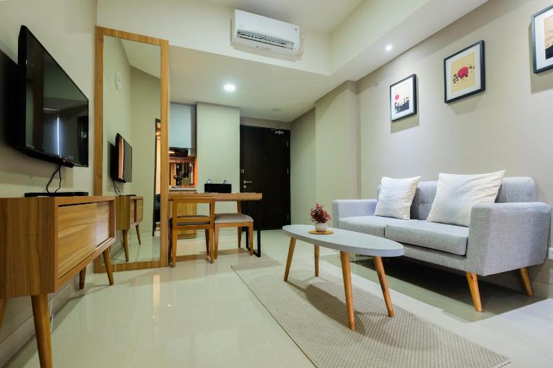Best Location 1BR Apartment Mustika Golf Residence By Travelio - image 9