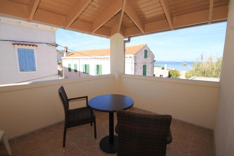 One-Bedroom Apartment with Terrace and Sea View image 2