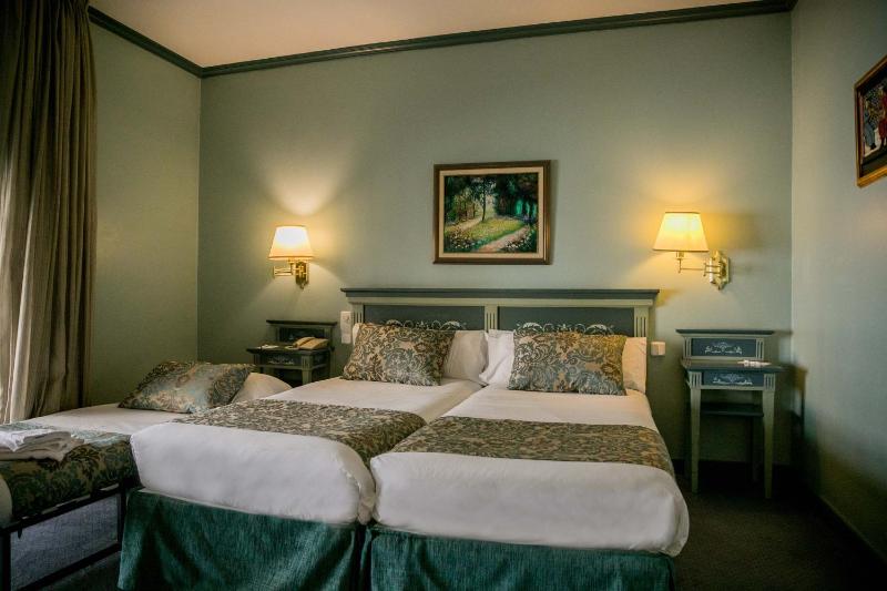 Standard Triple Room (2 Adults+ 1 child) image 4