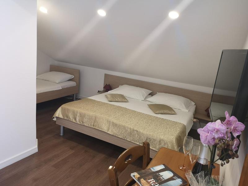 Triple Room with Balcony - Attic image 1