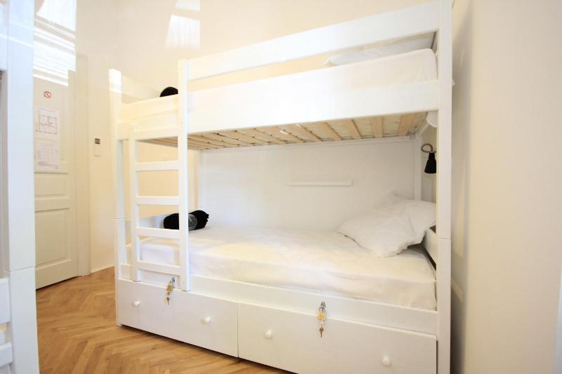 Single Bed in 4-Bed Dormitory Room with Shared Bathroom image 1