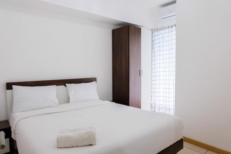 Minimalist 2BR Apartment at M-Town Residence By Travelio - image 1