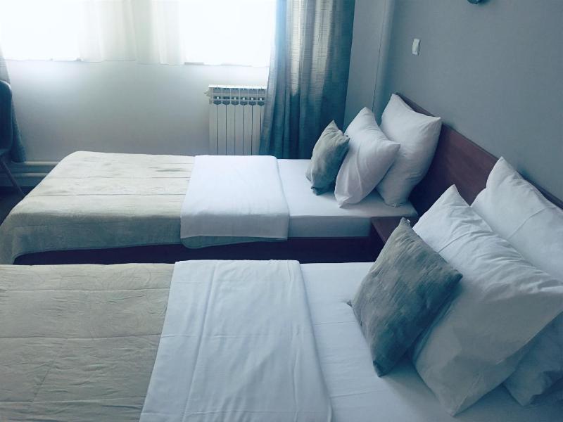 Quadruple Room with Private Bathroom image 3