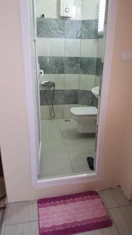 Family Room with Shared Bathroom image 2