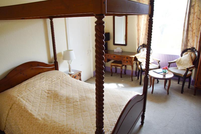 Room with Four-Poster Bed image 4