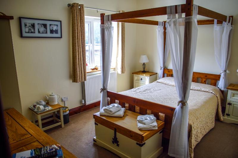 Room with Four-Poster Bed image 2