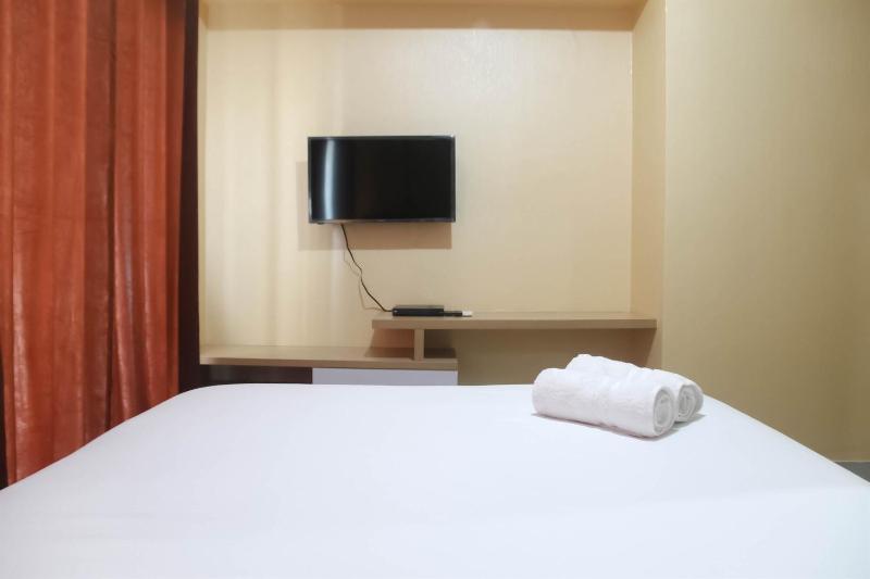 Spacious 1BR at The Oasis Cikarang Apartment By Travelio - image 13