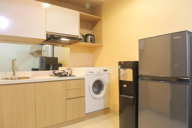 Spacious 1BR at The Oasis Cikarang Apartment By Travelio - image 2