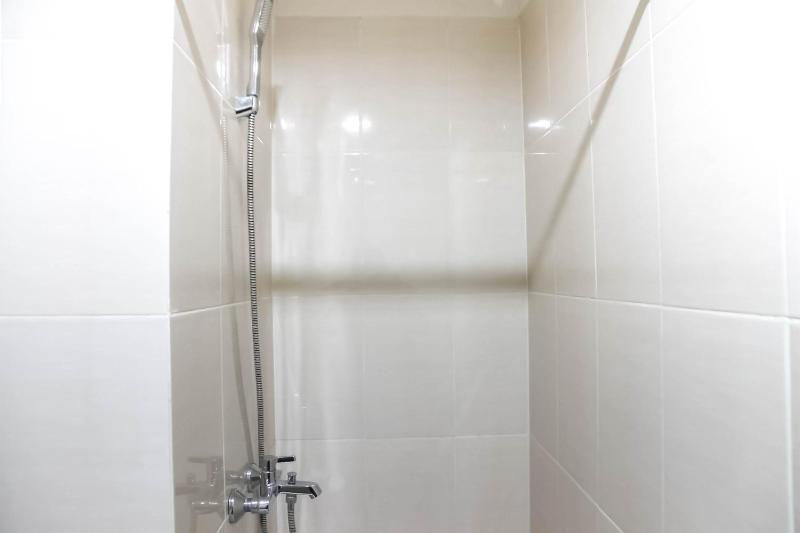 Spacious 1BR at The Oasis Cikarang Apartment By Travelio - image 3