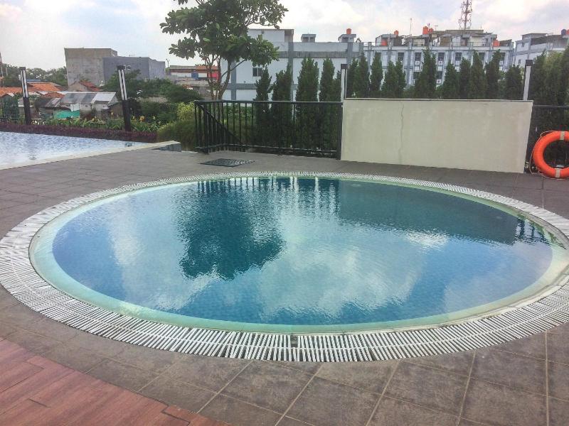Spacious 1BR at The Oasis Cikarang Apartment By Travelio - image 17