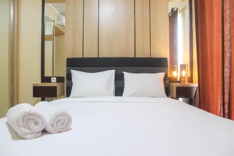 Spacious 1BR at The Oasis Cikarang Apartment By Travelio - image 5