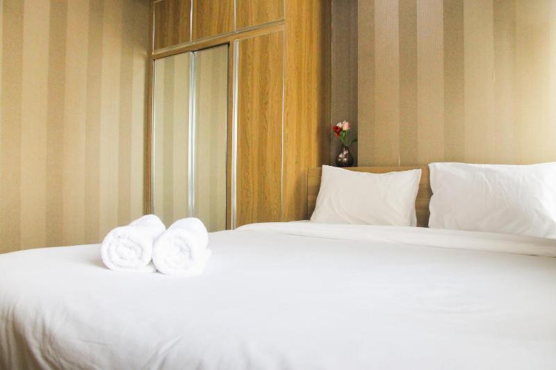 1BR with Extra Balcony The Oasis Cikarang Apartment By Travelio - image 11