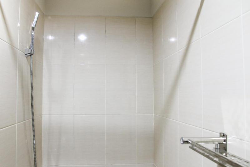 1BR with Extra Balcony The Oasis Cikarang Apartment By Travelio - image 10