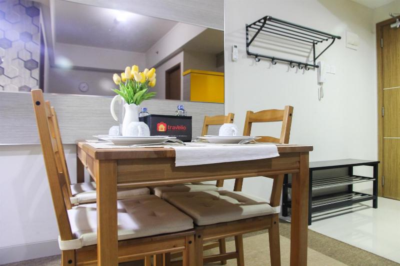 1BR with Extra Balcony The Oasis Cikarang Apartment By Travelio - image 9