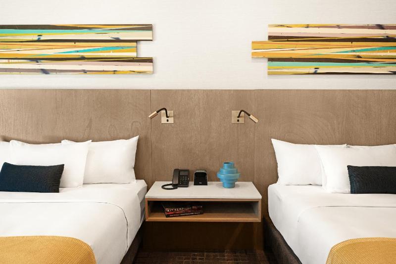 Deluxe Queen Room with Two Queen Beds image 2