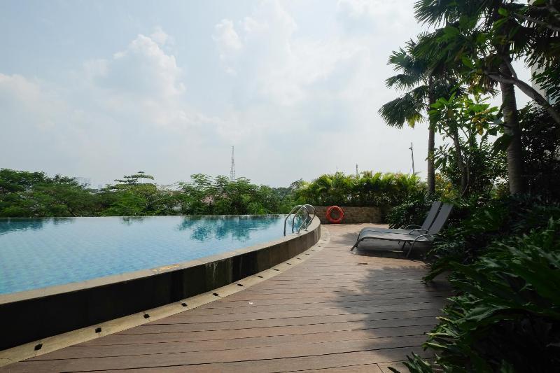 Furnished Studio No Kitchen Apartment Mustika Golf Residence By Travelio - image 11