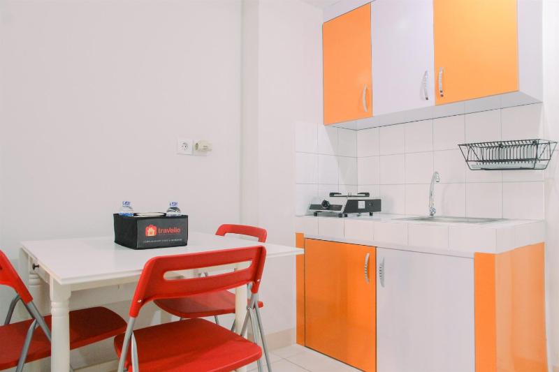 Nice 2BR at Springlake Summarecon Bekasi Apartment By Travelio - image 14