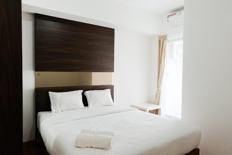Fully Furnished 2BR Apartment at M-Town Residence By Travelio - image 9
