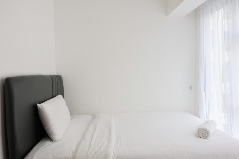 Fully Furnished 2BR Apartment at M-Town Residence By Travelio - image 12