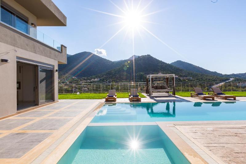 Oraia Eleni Villa, infinite coastal views, By ThinkVilla Images