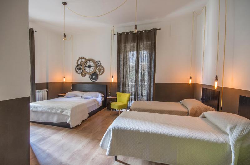 Quadruple Room with Private Bathroom image 1