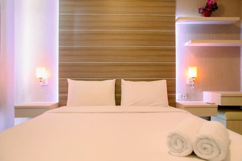 Best Price 1BR Apartment at The Oasis Cikarang By Travelio - image 1